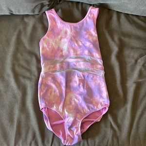 Pink and purple tie-dye leotard with open back.